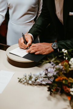 Signing the papers on marriage