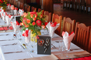 Table setup for a celebration with a lovely floral arrangement