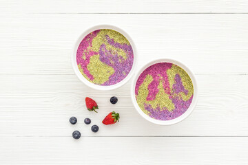 Breakfast Acai smoothie bowles with chia seeds and strawberries