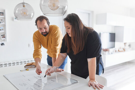 Young couple working from home
