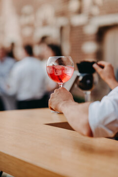 Red gin & tonic served