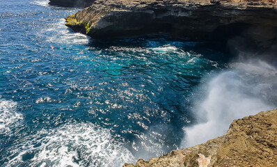 Devil''s tears - the most popular tourist destination of Nusa lambongan, Bali, Indonesia. Incredible view of the water hitting the rocks in Bali island.