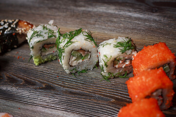 eating sushi roll delicacy food diet gourmet asian cuisine wooden background