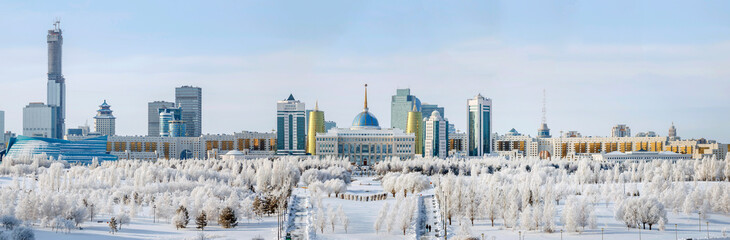 Kazakhstan, Nur-Sultan. The center of the left bank of modern Astana with the building of the presidential residence - Akorda. Winter panorama of the city. - 420709269