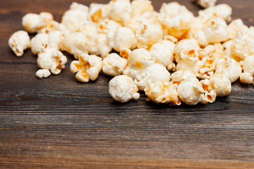 popcorn on a wooden table snack classic delicacy entertainment
