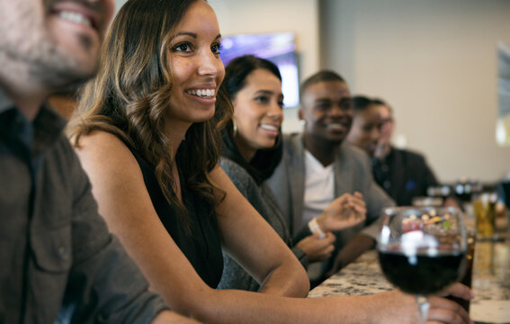 Restaurant: Group Of People Watching Sports On Television