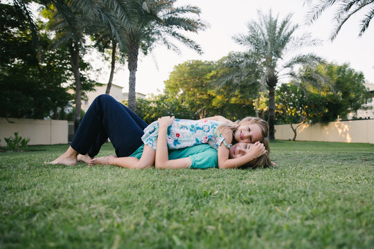 A mother with a daughter in the park