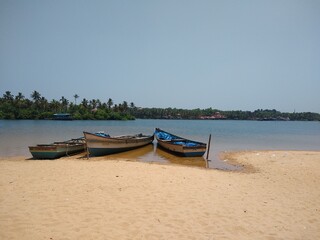 Fototapeta na wymiar boats on the beach, Pozhiyoor Thiruvananthapuram Kerala
