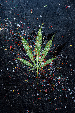 Cannabis leaf with spices and oil