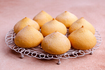 Sponge cookies on a cement background.
