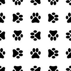 Seamless pattern with footprints. Background with black footprints of a cat or dog