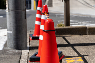 Fototapeta na wymiar Traffic cones on a street in Japan