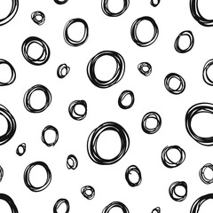 Scribble circles hand drawn seamless vector pattern. Chaotic rings ink dirty texture.