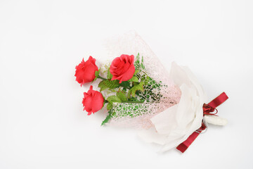 A bouquet of paper roses in white background