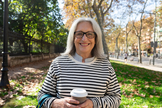 Mature woman daily routine in Barcelona, commute, tai-chi and grocery shopping in the city