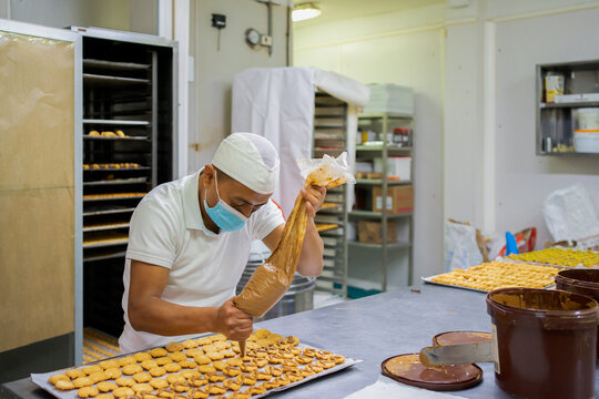 Preparing Cookies With A Pastry Bag.
