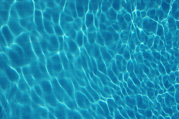 Swimming pool water surface in the sunlight