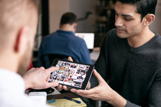 Business: Team Works On Graphic Design For New Project