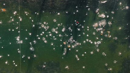 fishermen on the ice, overhead view of the frozen lake
