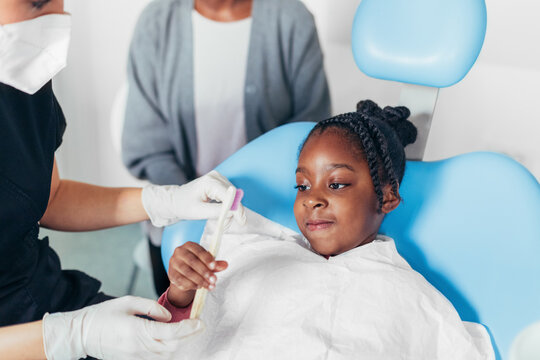 An African American Girl at a Dentist