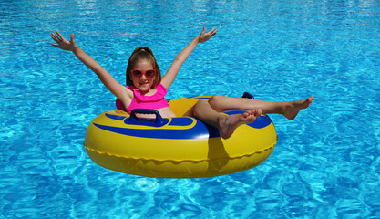 Little girl with inflatable ring