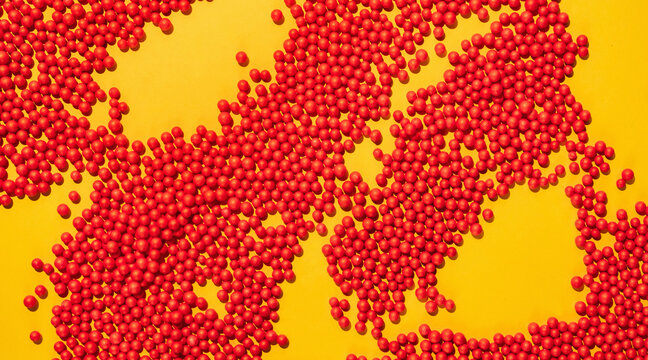 Bunch Of Red Round Shapes-Balls On Yellow Background.