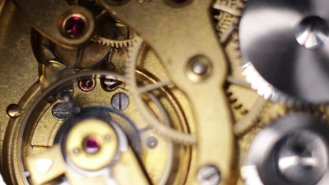 working clockwork gears (clock mechanism) inside a vintage clock