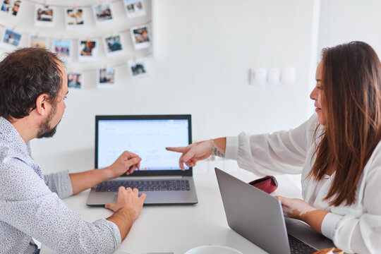 Young couple working from home