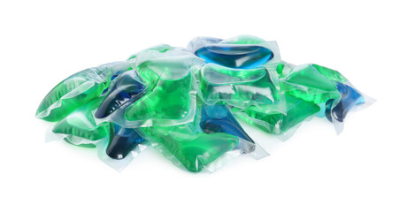Heap of laundry capsules on white background