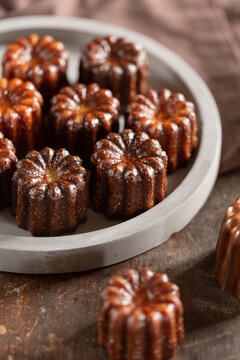 Canel&eacute; - French pastry on a grey plate