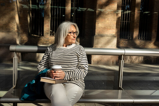 Mature woman daily routine in Barcelona, commute, tai-chi and grocery shopping in the city