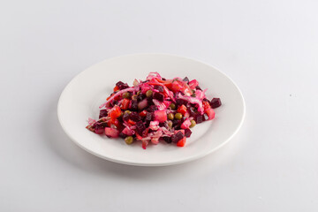 Isolated russian national beetroot salad vinaigrette on the white