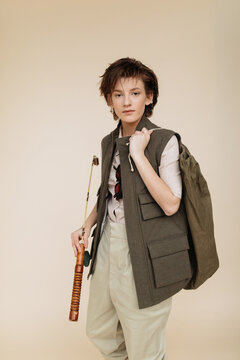 Trendy female angler with rod