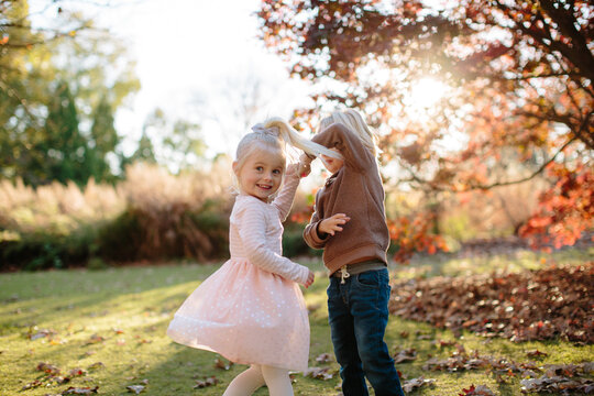 Young children dancing together