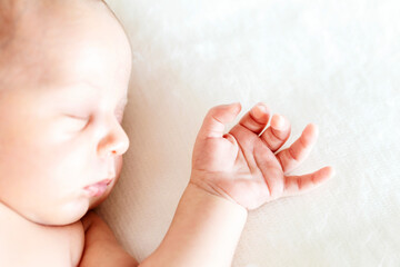 Close up of newborn baby hand