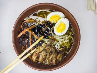 Ramen on a white table
