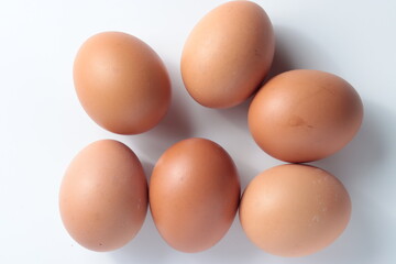 top view of chicken eggs isolated in white background