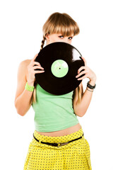 playful blond girl with vinyl records