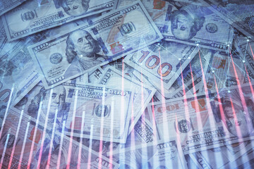 Double exposure of forex graph drawing over us dollars bill background. Concept of financial markets.