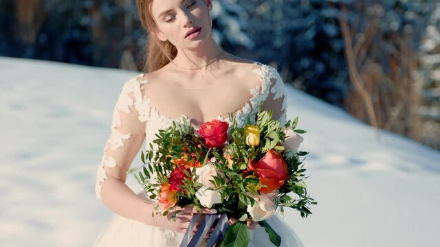 bride with a large bouquet of flowers