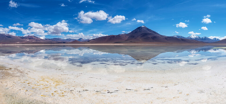 Reflection of a volcano on the lake in the Andean Highlands