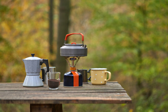 Tourist set with metal cookware for making coffee.