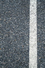 Fototapeta premium White stripe on road, line marking on an asphalt road.