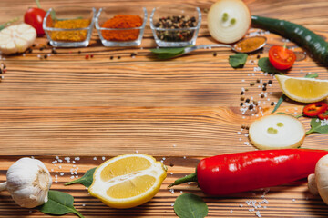 Cooking table. Background with spices and vegetables. Top view. Free space for your text.