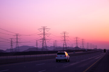 high-voltage electricity poles Tower - power station - distribute Electric energy , sunset