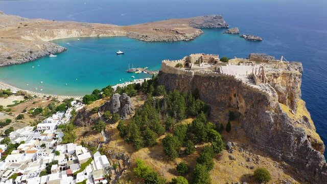 Ruins of Acropolis of Lindos view from above, Rhodes, Dodecanese Islands, Greek Islands, Greece. Acropolis of Lindos, ancient architecture of Rhodes, Greece.
