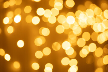
golden illuminated bokeh in the dark
