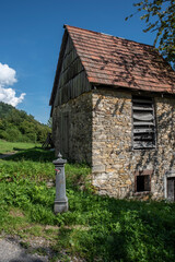 Obraz premium Ancient landscapes of Carnia. Stables and hay depots Orias.