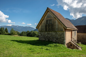 Obraz premium Ancient landscapes of Carnia. Stables and hay depots Orias.