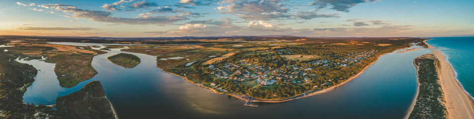 Ultra wide panorama of Marlo township and the Snowy River at sunset. Victoria, Australia. - obrazy, fototapety, plakaty